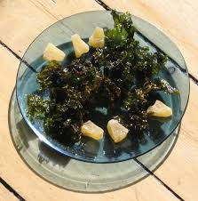 Roasted nori packets and a salt cellar stored in a dark pantry
